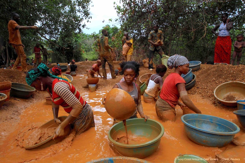 REFILE - QUALITY REPEAT Prospectors pan for gold at a new gold mine found in a cocoa farm near the town of Bouafle in western Ivory Coast March 18, 2014. With high prices for the precious metal fuelling a gold rush in Ivory Coast and Ghana, diggers are scurrying to cash in. But the drain on the labour market and the harm done to cocoa plantations could endanger cocoa production in the two nations, which account for 60 percent of global supply. Picture taken March 18, 2014. To match Insight COCOA-GOLD/WESTAFRICA REUTERS/Luc Gnago - RC1E9B752150